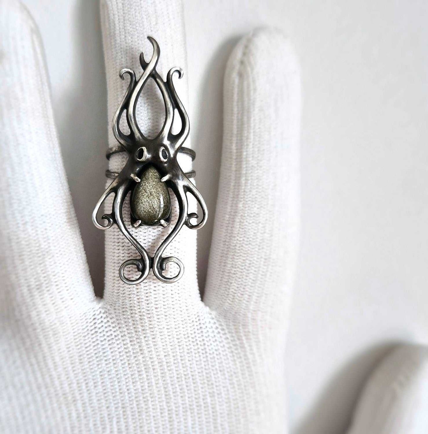 Adjustable dreamlike silver Octopus ring with natural gemstone, photographed in soft lighting