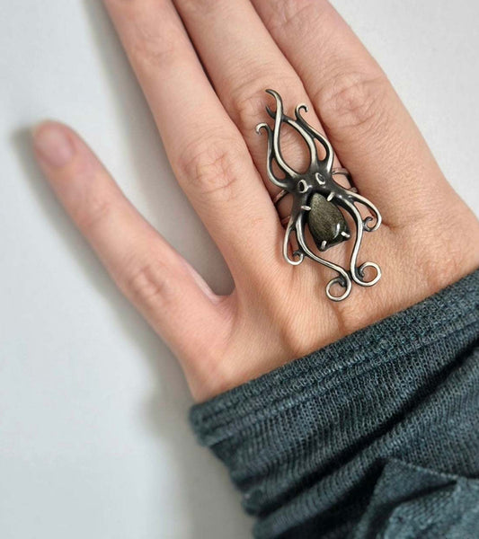 Adjustable sterling Octopus ring with natural gemstone, photographed in soft lighting