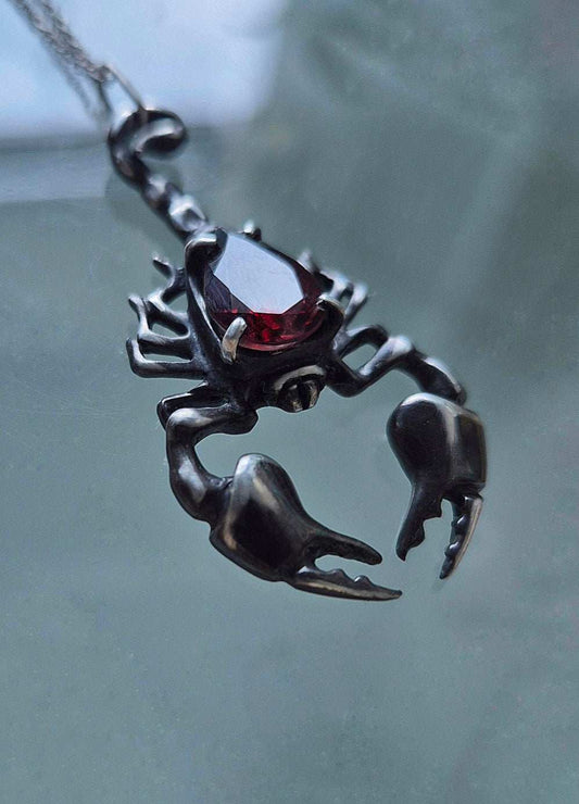 Scorpion necklace with Garnet