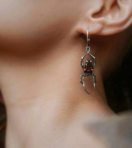 spider earrings in sterling silver - garnets