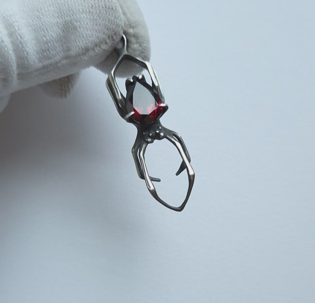 Dragonblood spider pendant with a FACETED GARNET gem, Witchy silver talisman video