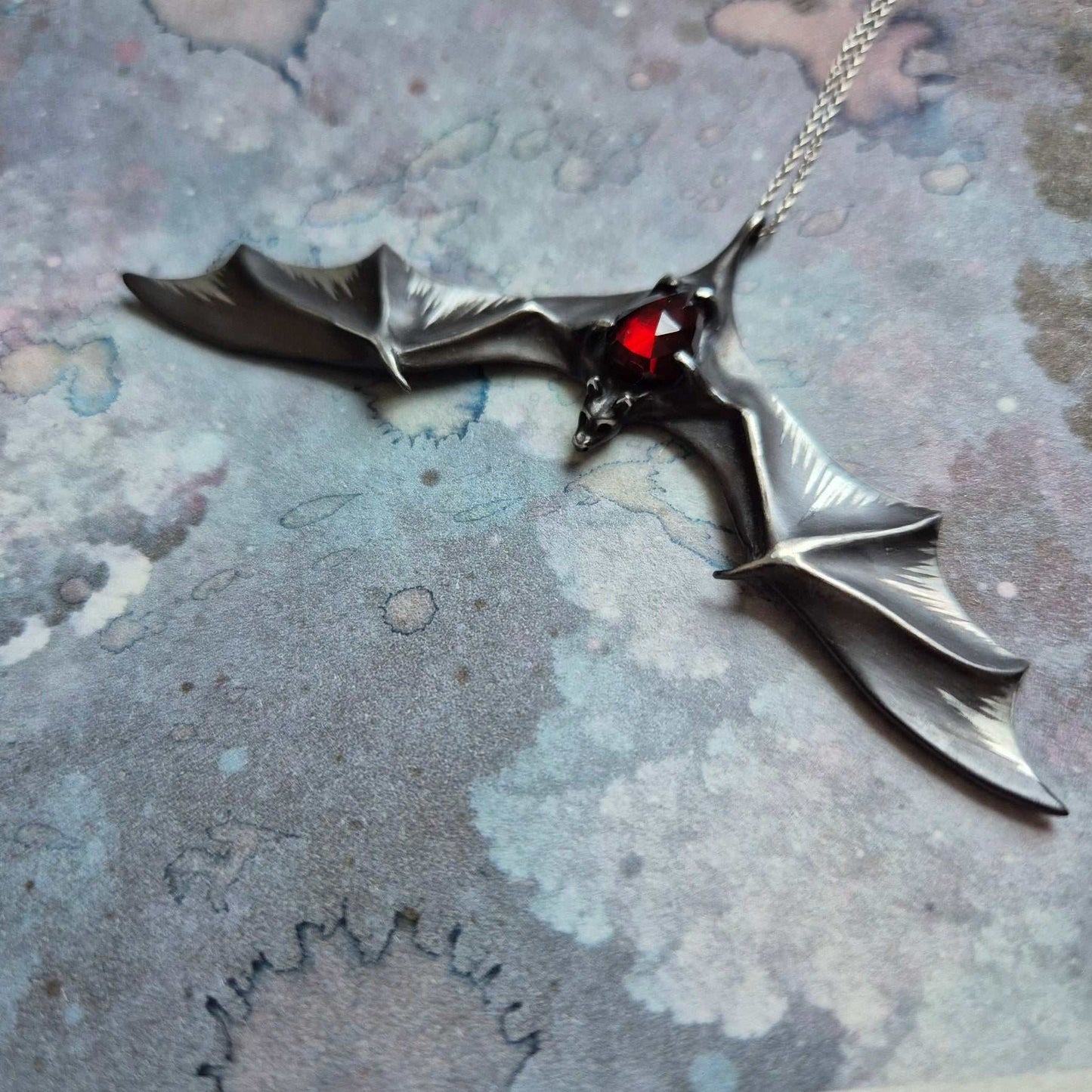 Dragonblood Bat MADE TO ORDER pendant with a rosecut garnet gem, Witchy silver talisman