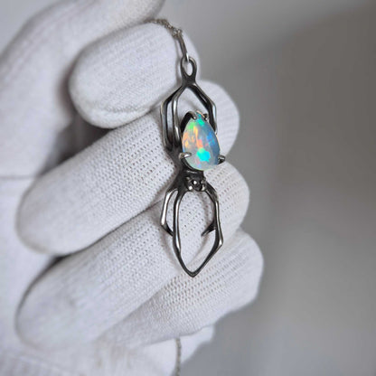 Opal Spider pendant with a faceted Ethiopian opal, Witchy silver talisman