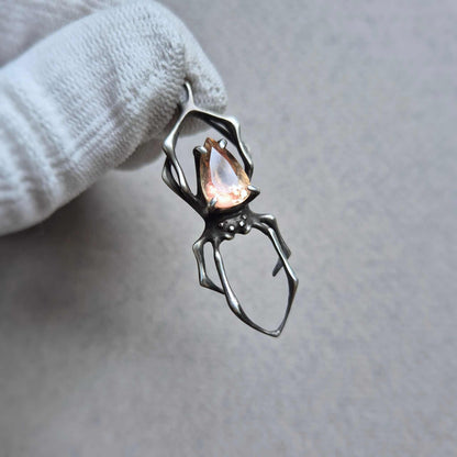 Golden dew Spider pendant with a faceted Oregon sunstone gem, handmade Witchy Solar energy silver talisman