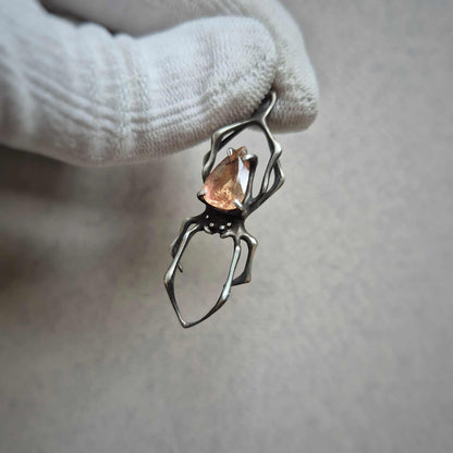 Golden dew Spider pendant with a faceted Oregon sunstone gem, handmade Witchy Solar energy silver talisman