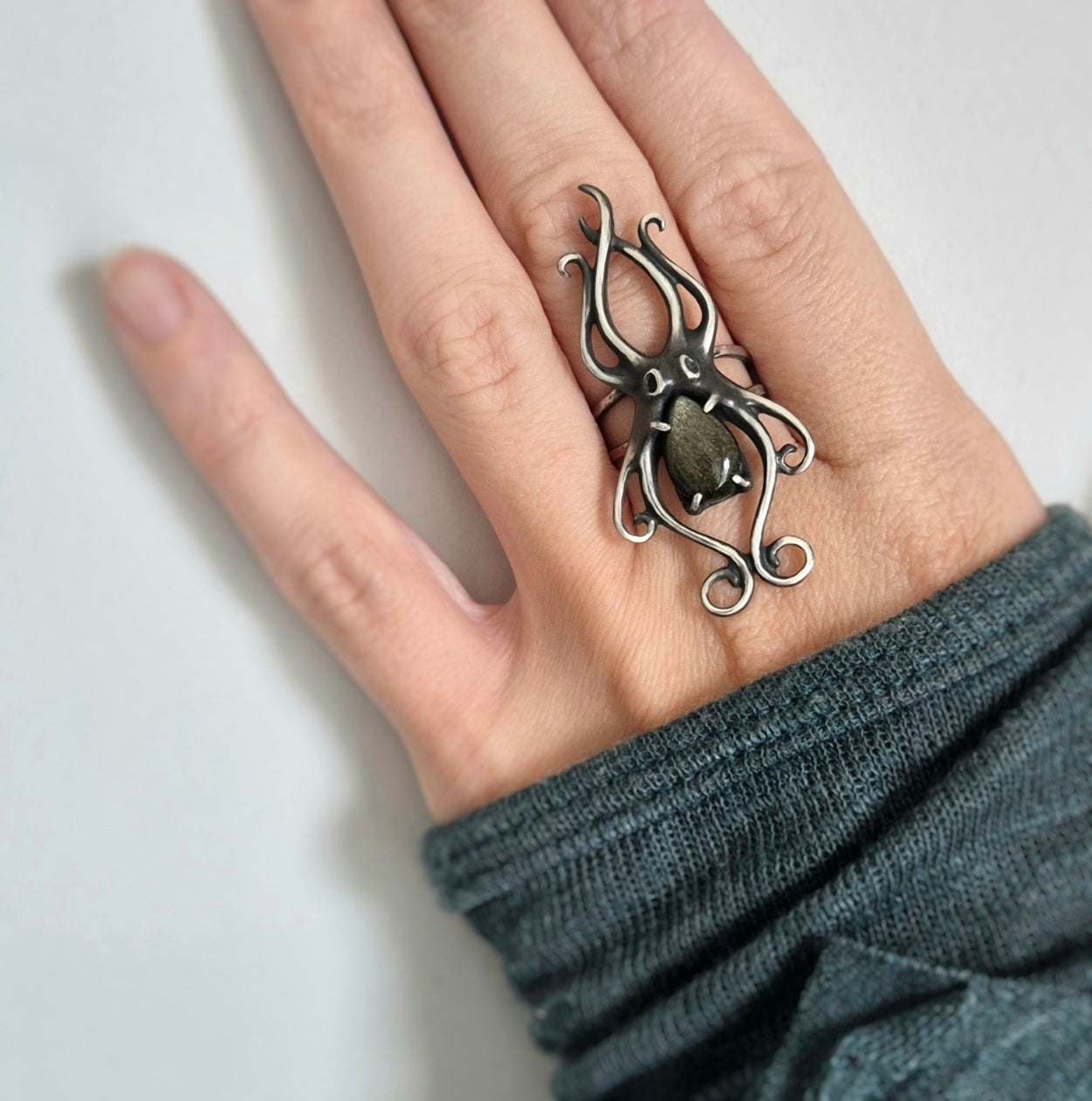 Golden Obsidian Octopus ring with a faceted labradorite gem, sea witch silver ring