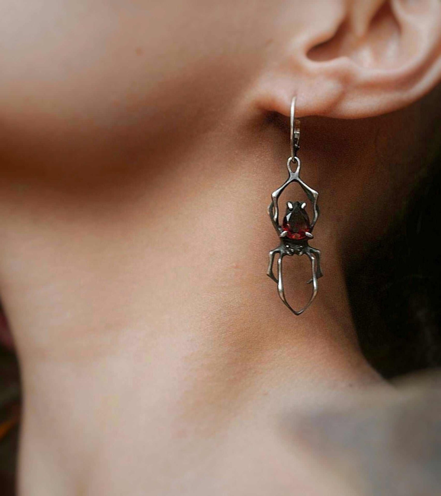 spider earrings in sterling silver - garnets