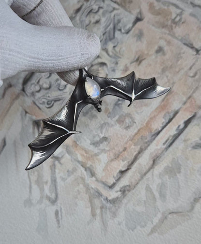 Lunar Bat pendant with a rainbow moonstone cabochon gem, handmade Witchy silver talisman