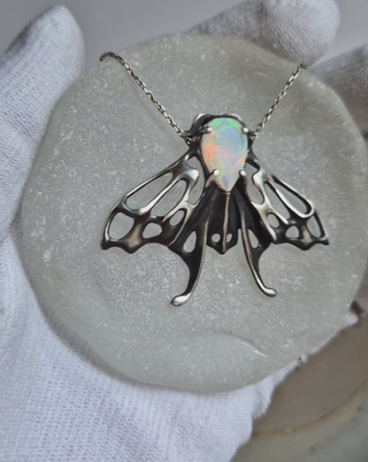 Opal Moth pendant with a natural Ethiopian opal gem, silver talisman