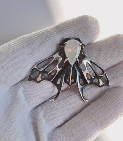 Opal Moth pendant with a natural Ethiopian opal gem, silver talisman