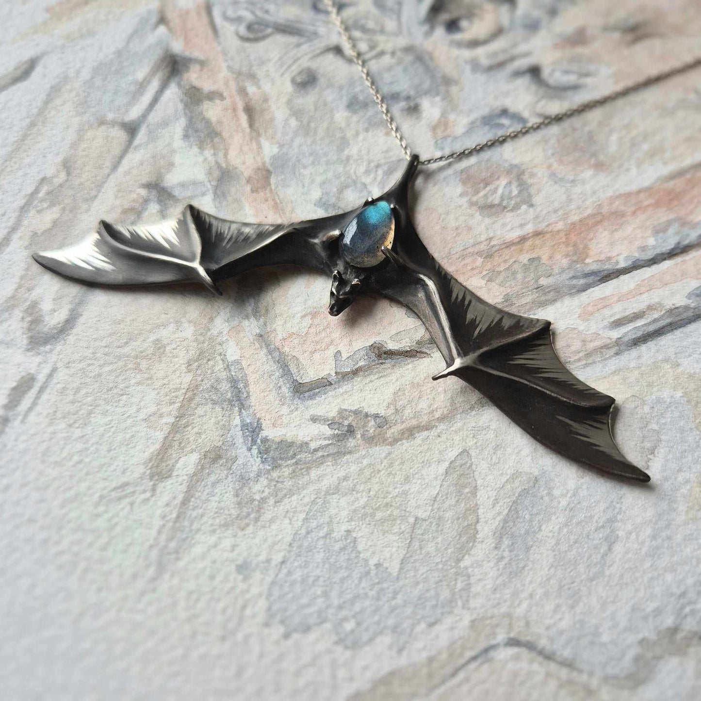 Silver Bat Pendant with Blue Labradorite, Handmade Gothic Talisman. Side view