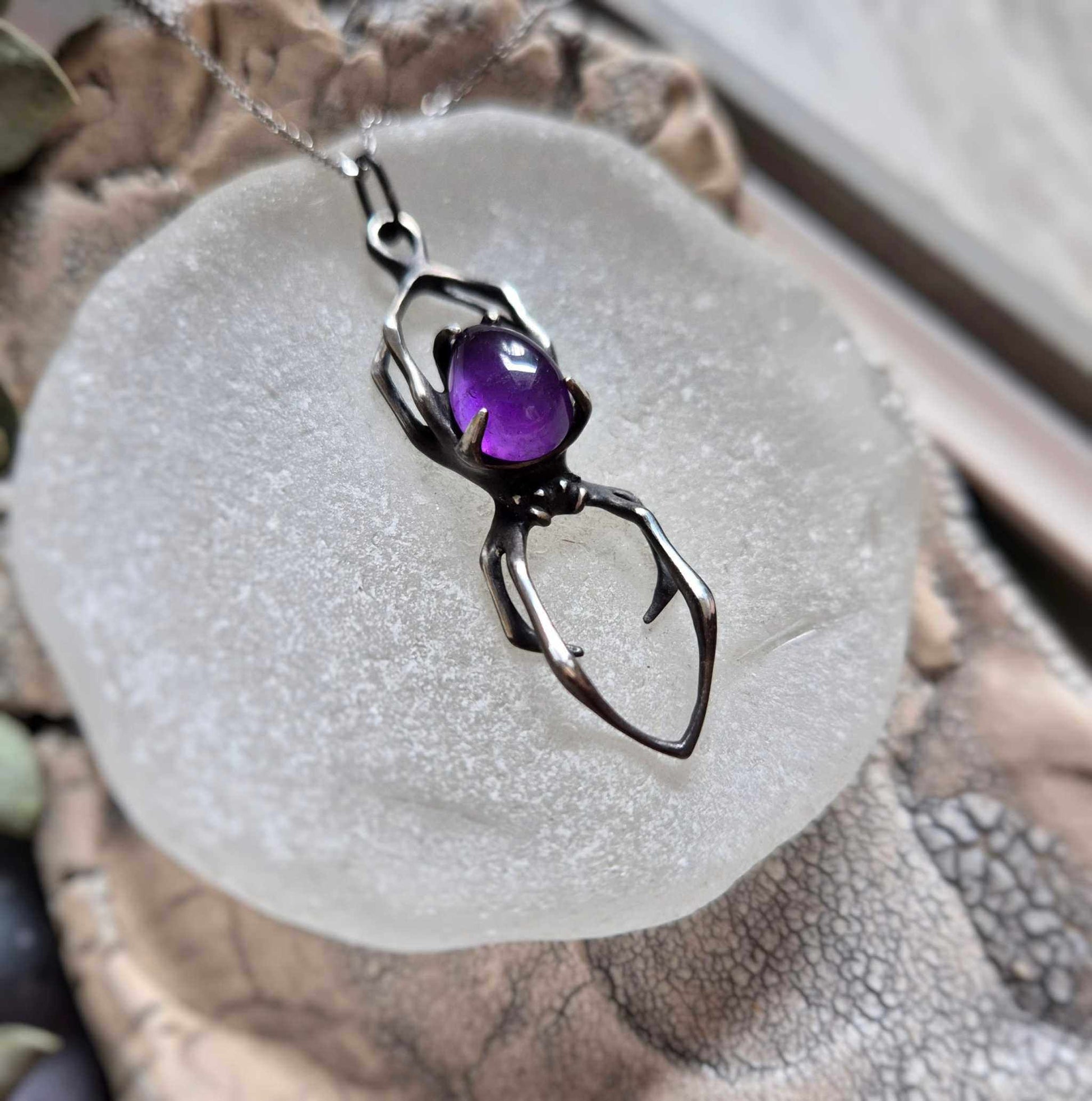 Handmade silver pendant with amethyst spider design, witchy jewelry