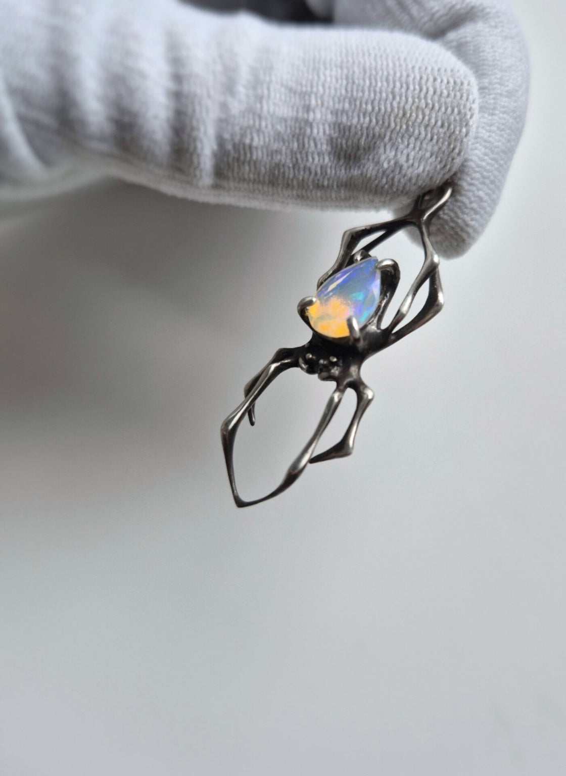 ace in Sterling silver with natural Opal gem with translucent body and colorful fire, on white background