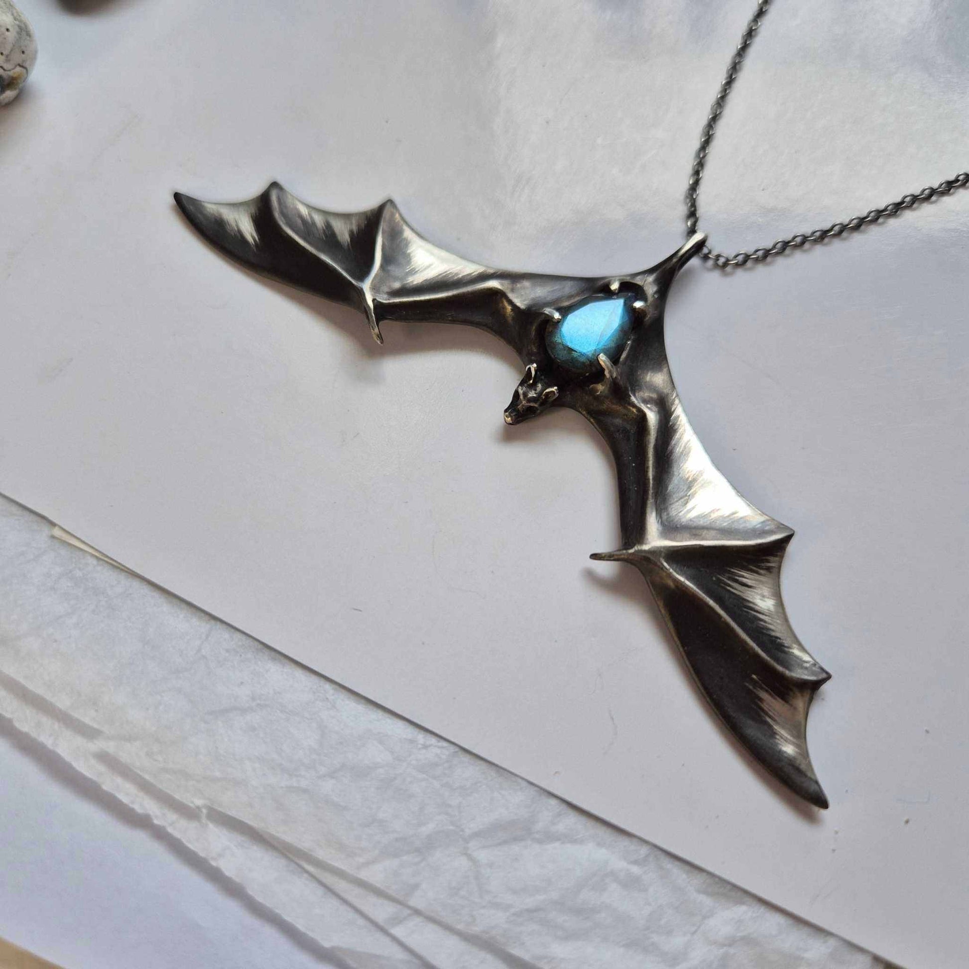 Aurora Bat pendant with a faceted blue labradorite gem, handmade Witchy - Vampire cosplay talisman front right view