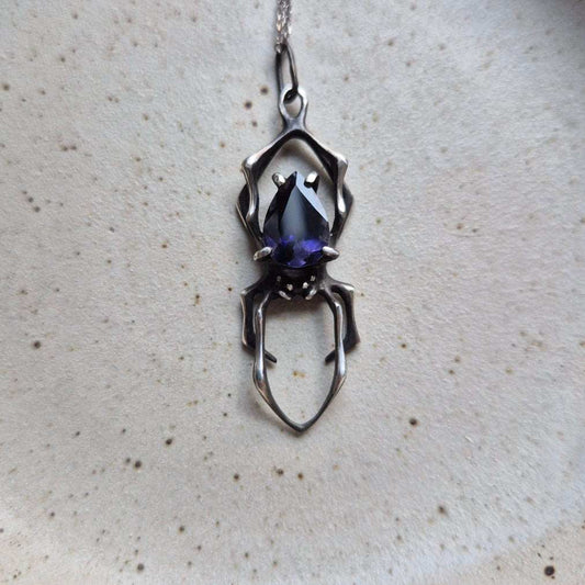 Night sky spider pendant with an iolite sunstone gem, Witchy silver talisman