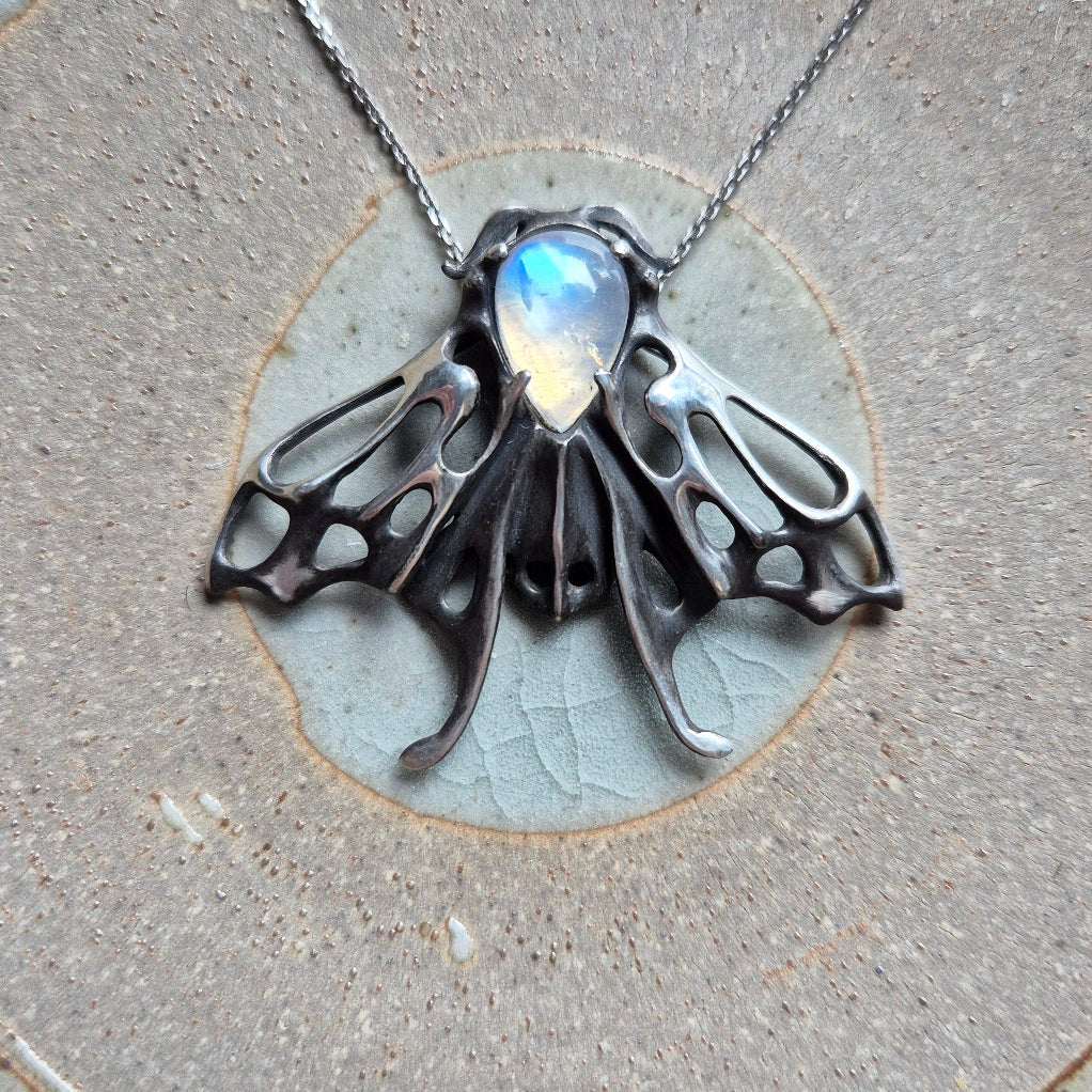 Lunar Moth Pendant, Silver Talisman with a rainbow moonstone gem