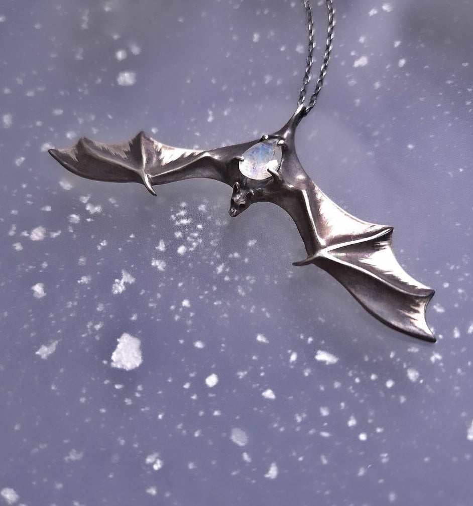 Silver bat pendant in dynamic flight pose - handmade necklace with bold silhouette