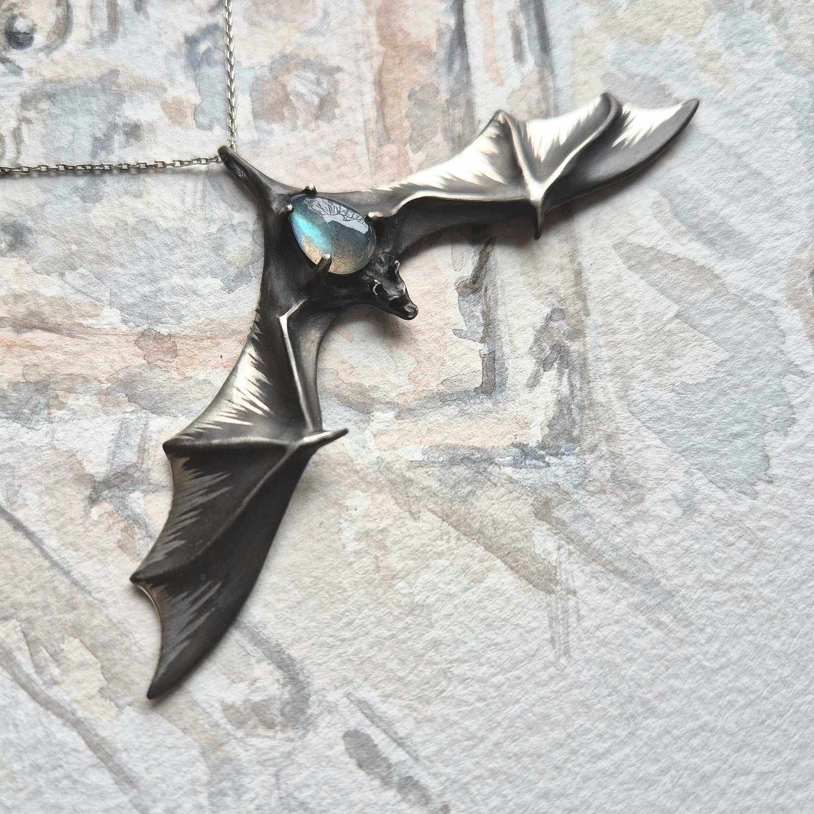 Silver Bat Pendant with Blue Labradorite, Handmade Gothic Talisman. Right side view